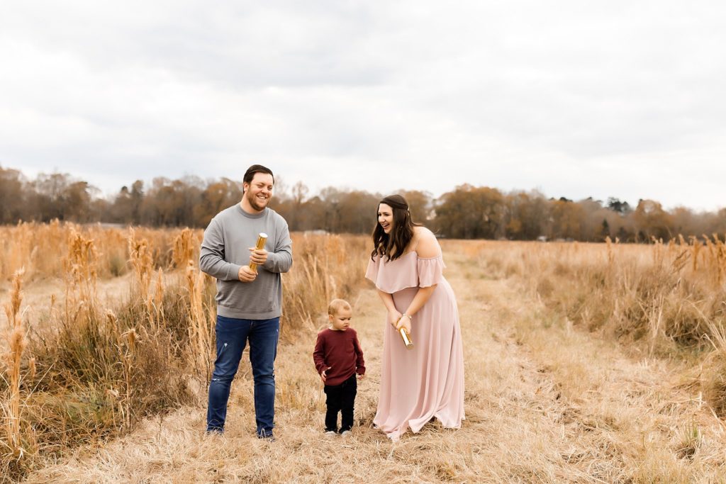 family-getting-ready-to-do-their-gender-reveal