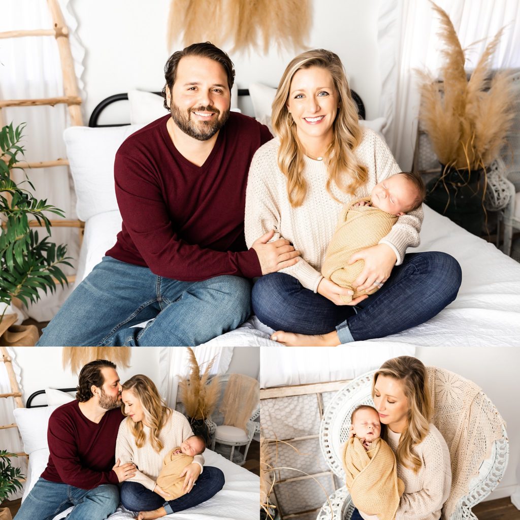 mom-and-dad-holding-newborn-on-bed-in-denham-springs-photography-studio