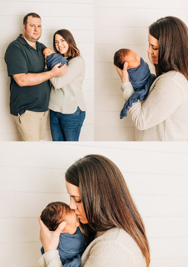 mom-and-dad-posing-with-their-newborn-baby-boy